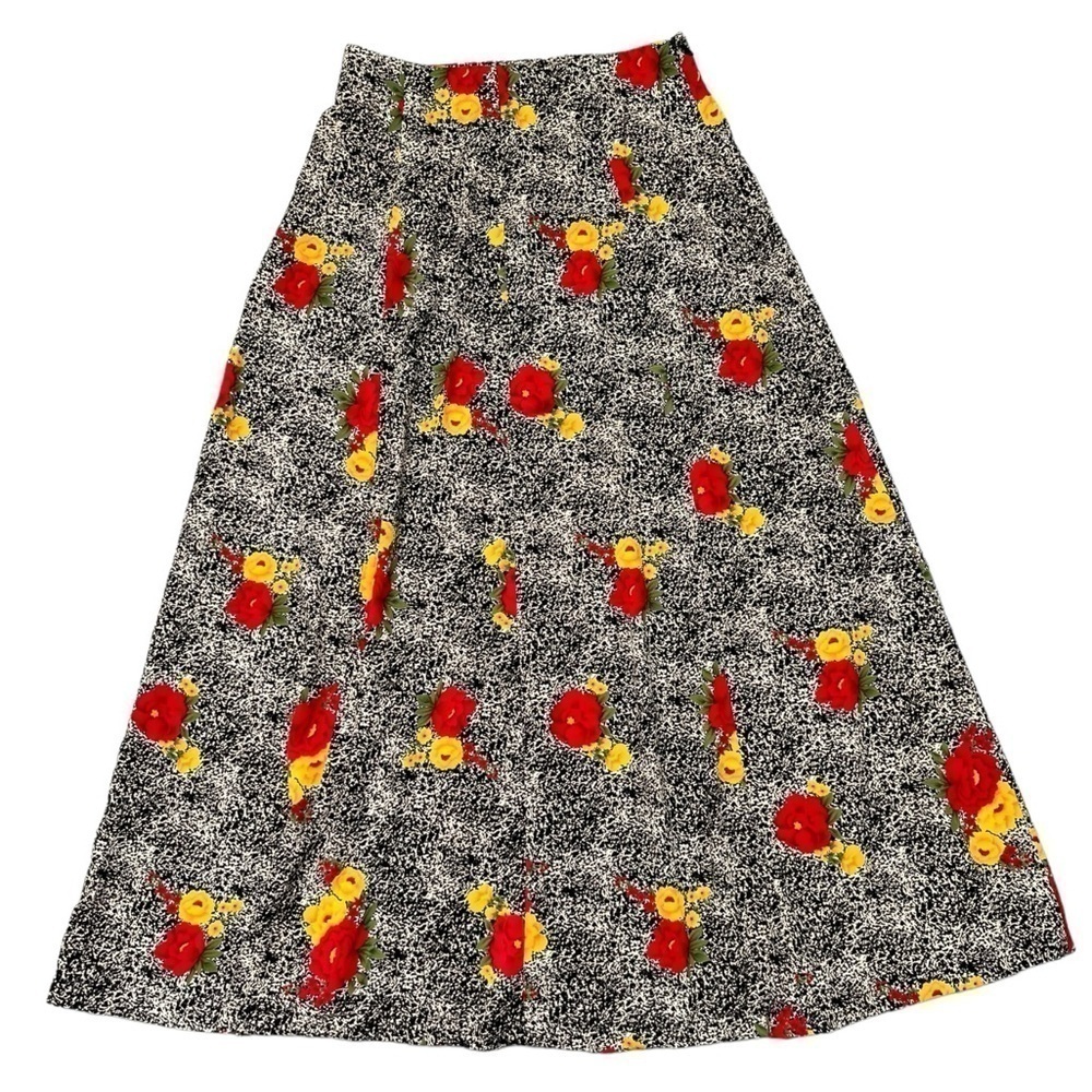 Vintage women’s full flowy black and beige midi skirt with bright floral pattern